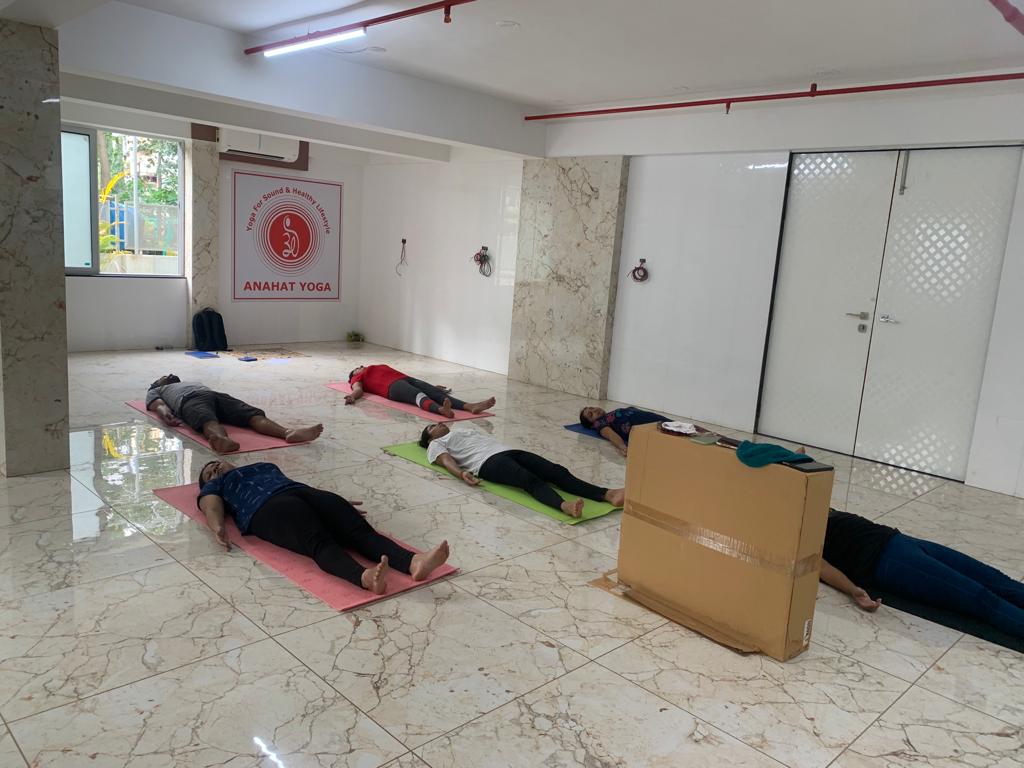 Yoga instructor guiding students in Pune